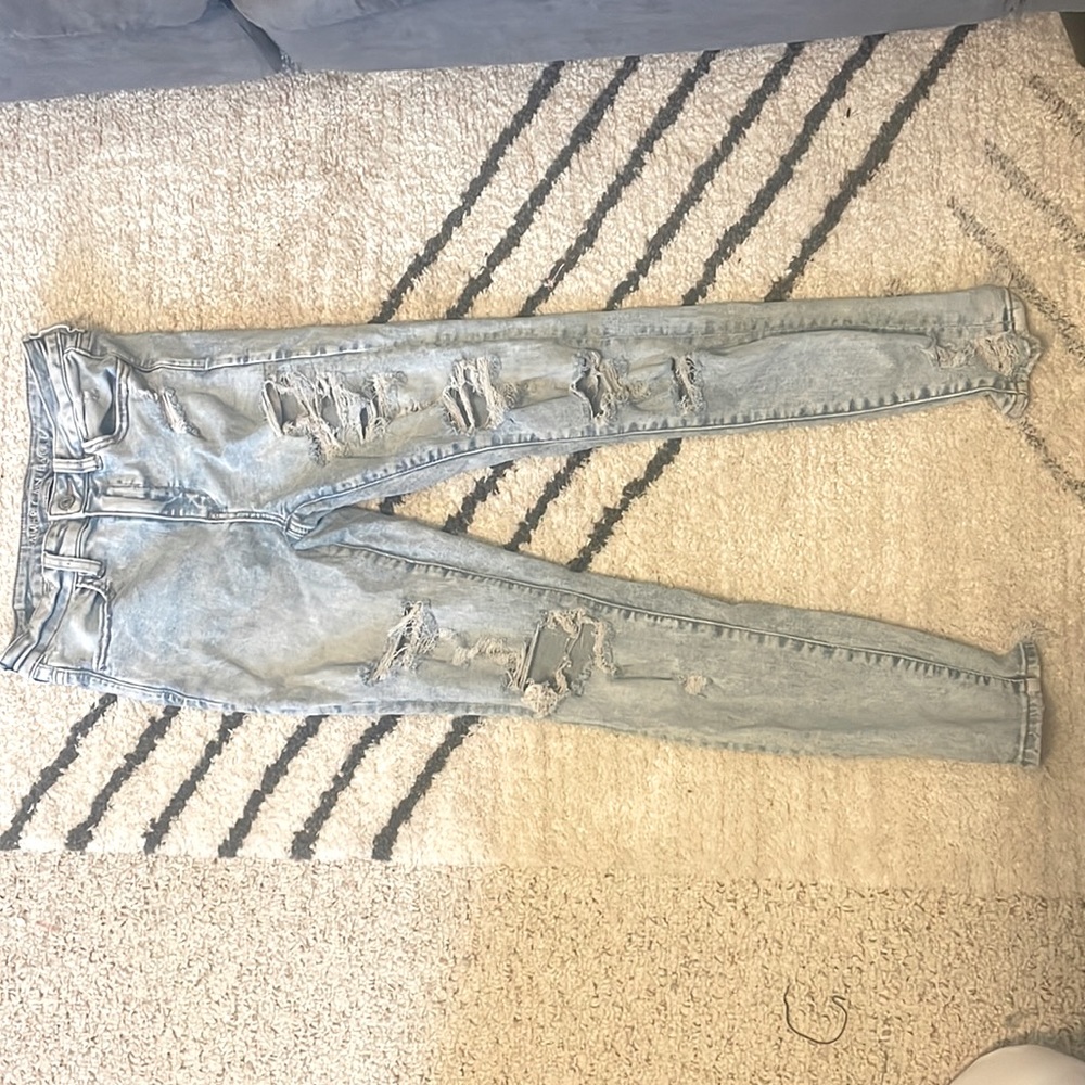 American Eagle light colored denim jeans - ripped, next level stretch